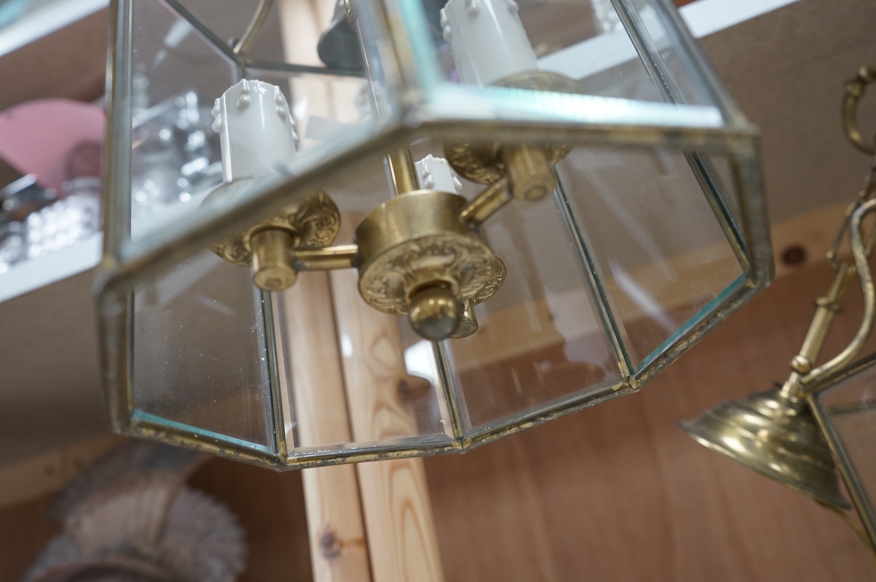A pair of French octagonal glass and brass lanterns, 40cm